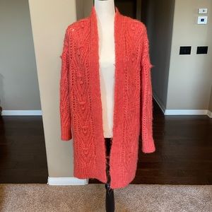 Coral colored sweater, size XS
